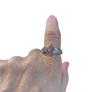 Avon silvertone pear shaped pink CZ ring size large NIB